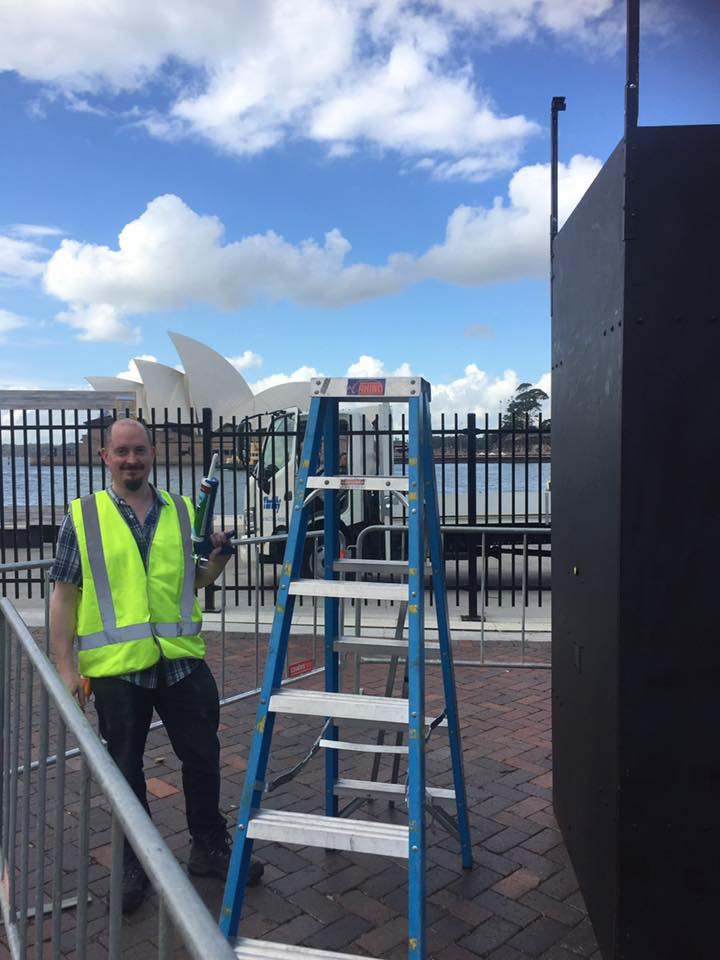 Putting up installation at the site next to the Port Authority in Sydney in view of the Opera House